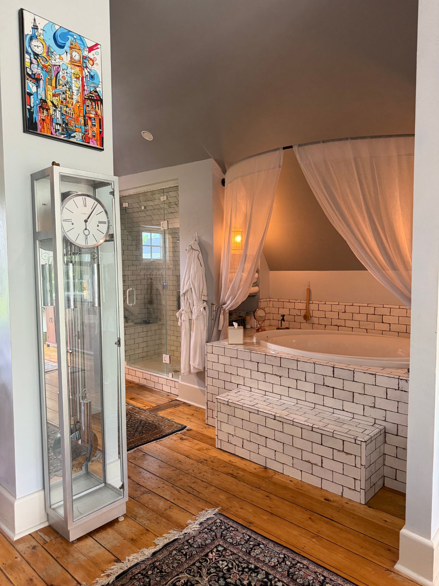 The suite's soaking tub and subway-tiled ensuite bath